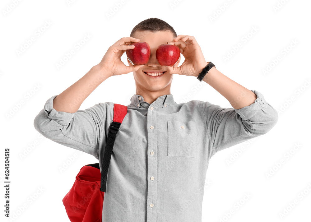 Male student with apples on white background