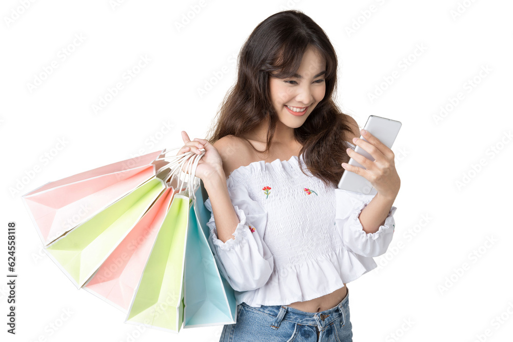 Young Asian woman usin shopping bag using phone on isolate background