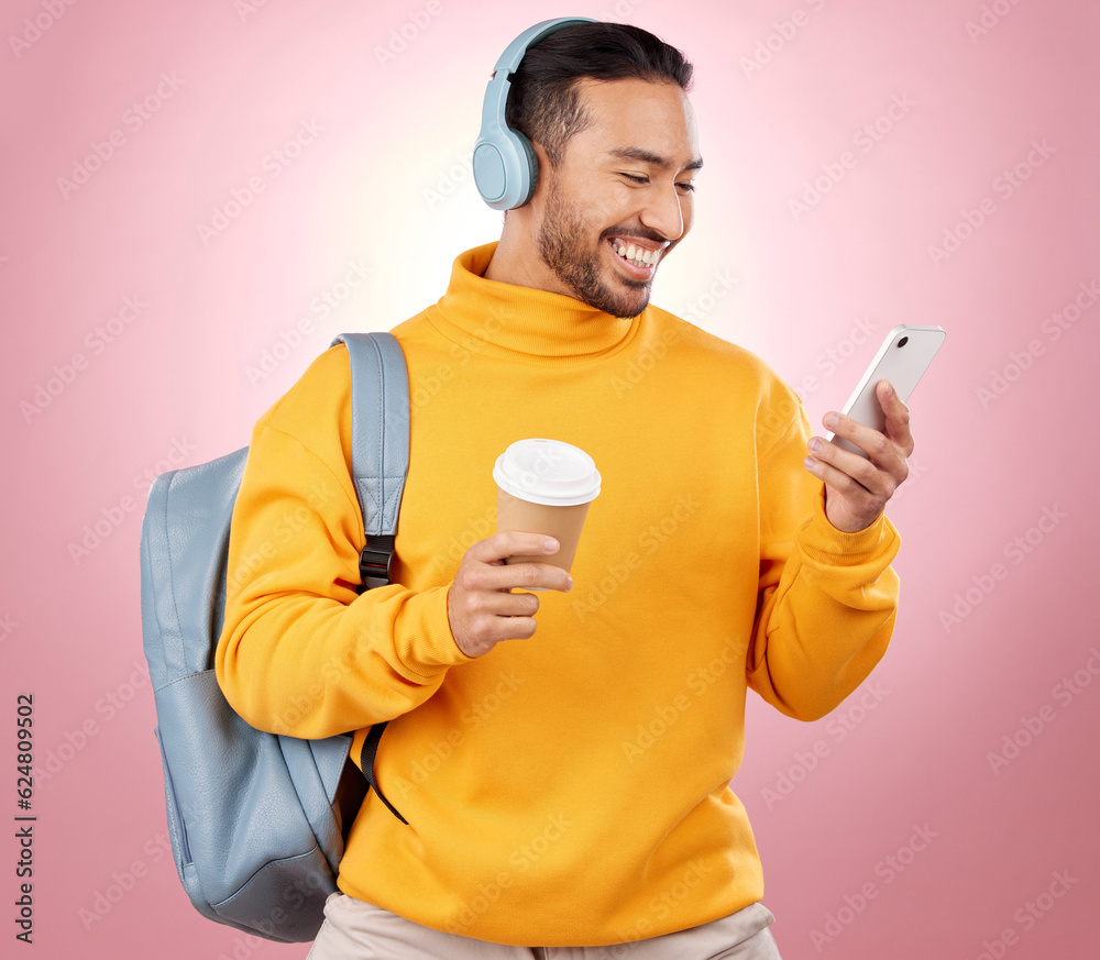 Backpack, phone and man listening to headphones or college podcast, travel and coffee on pink backgr