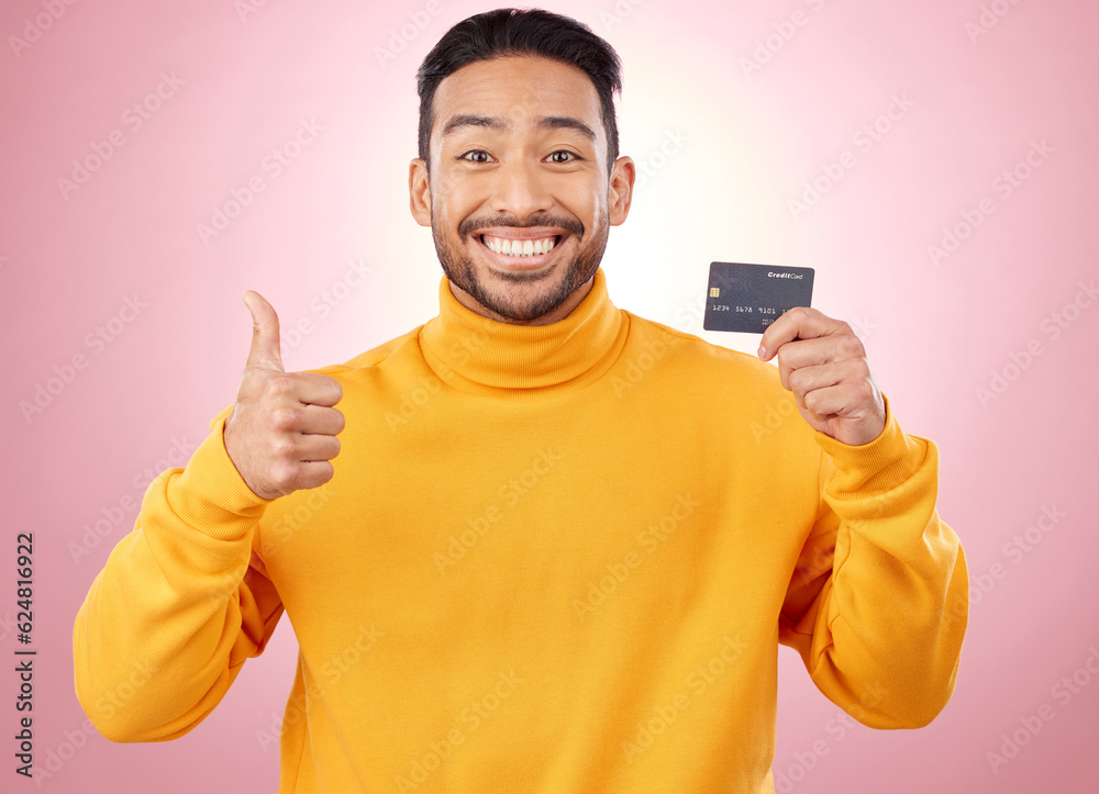 Man, thumbs up and credit card with finance, payment and loan, budget and fashion sale on studio pin