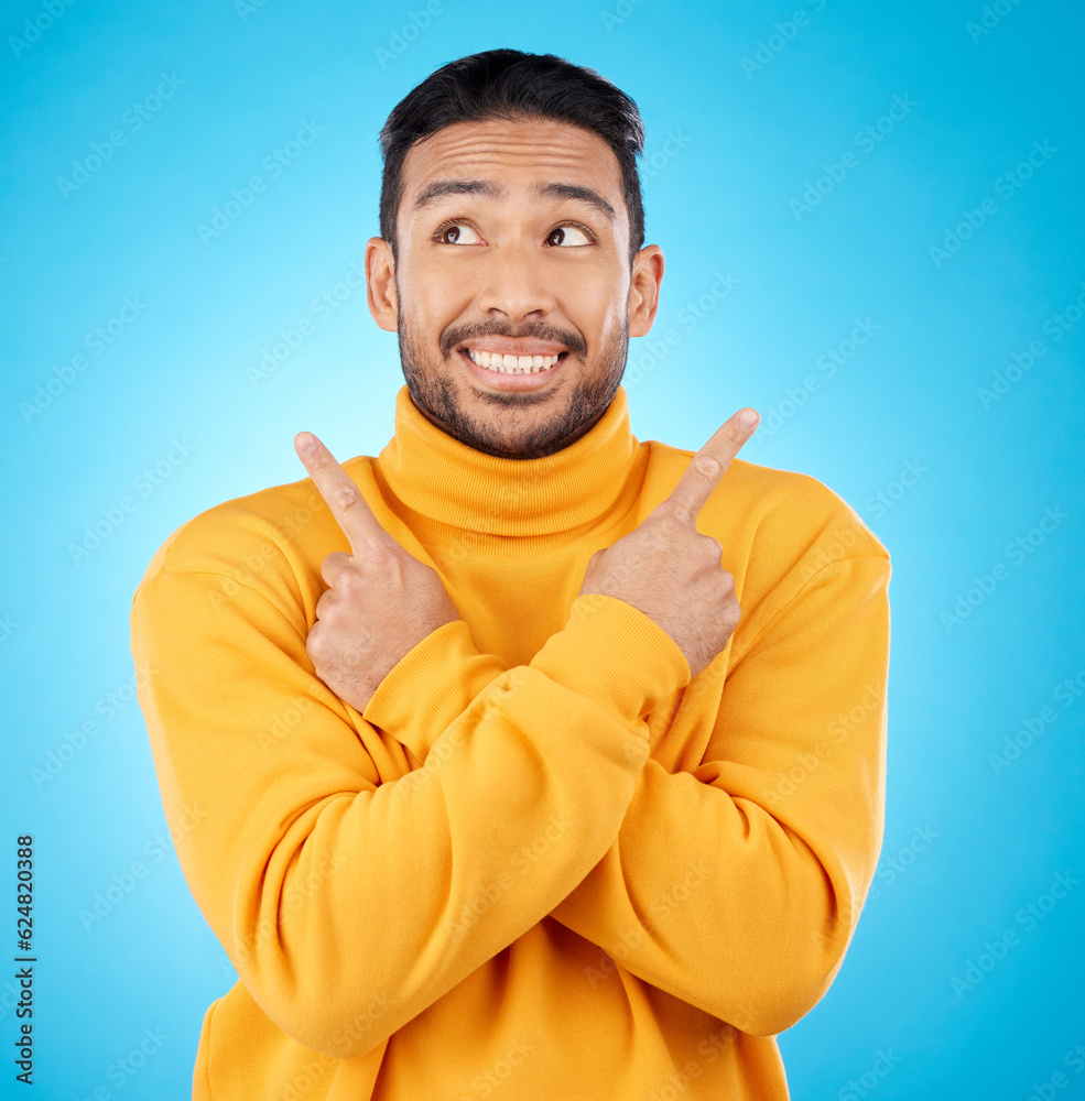 Smile, asian man and hand pointing to studio for news, deal or discount or how to guide on blue back