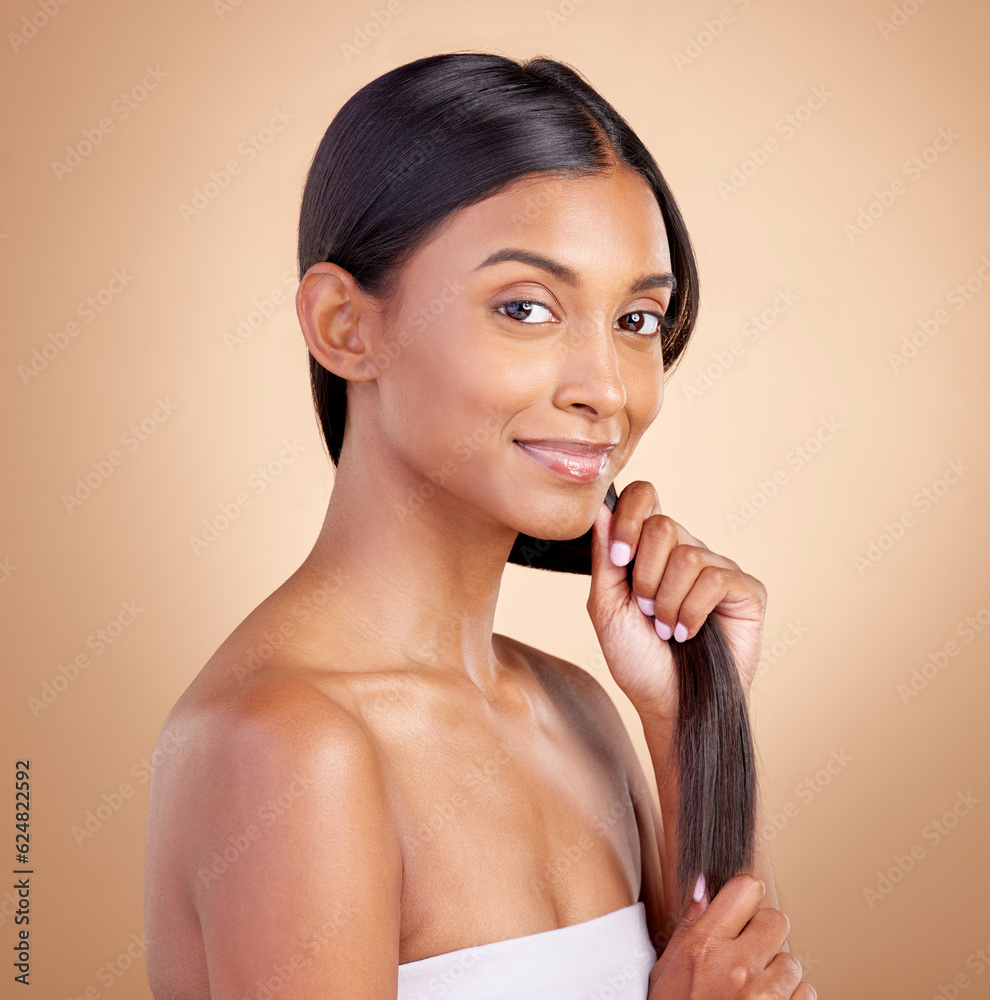 Portrait, hair care and Indian woman, with beauty, cosmetics and dermatology against a brown studio 