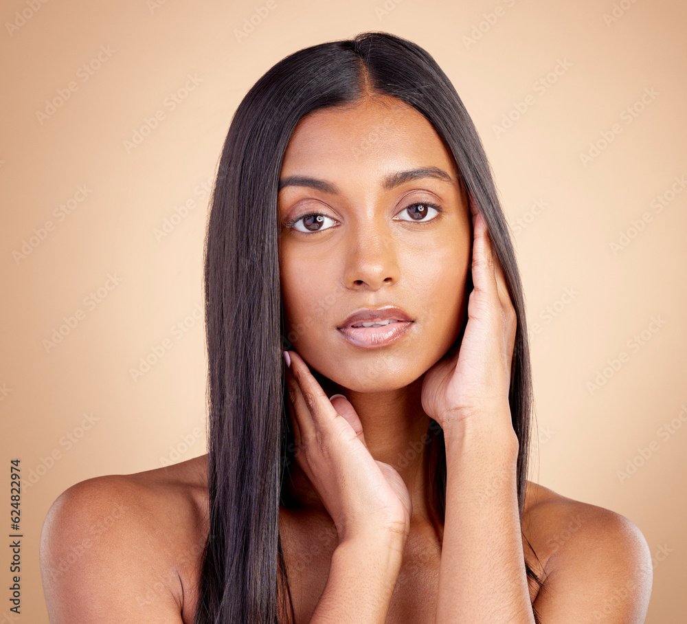 Portrait, hair care and Indian woman with cosmetics, makeup and skincare on a brown studio backgroun