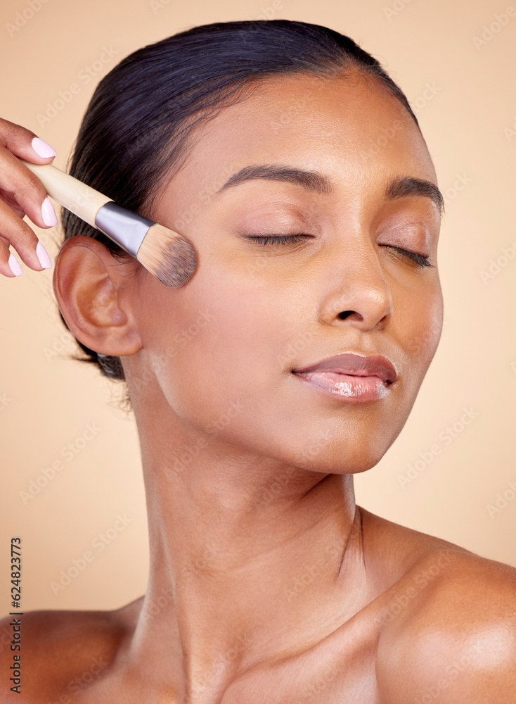 Beauty, makeup and foundation with woman and brush in studio for facial, relax and self care. Cosmet