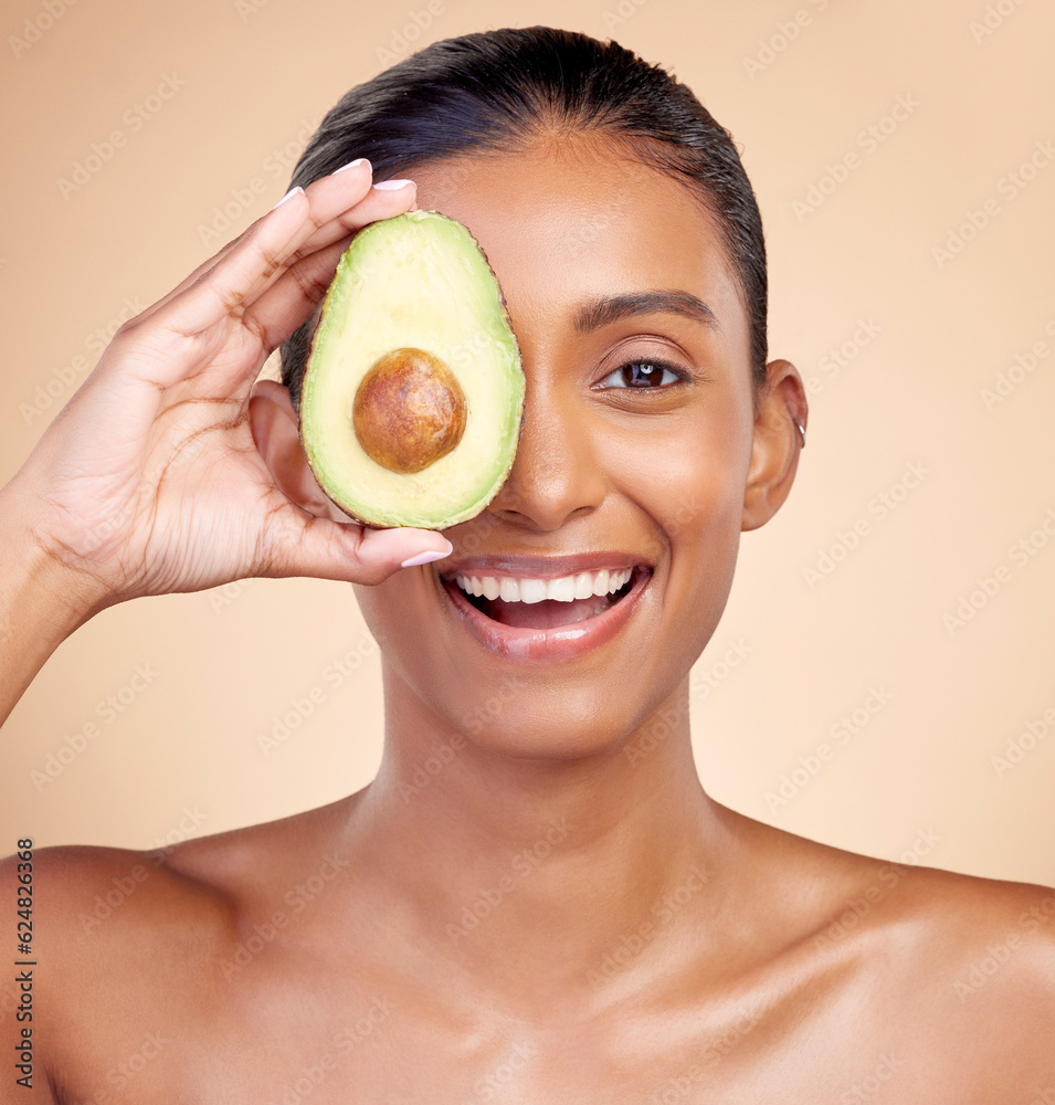 Avocado, skincare and portrait of happy woman in studio, background or aesthetic glow. Face of india