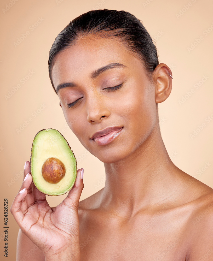 Avocado, facial beauty and woman in studio, background and omega 3 for aesthetic wellness. Face of c