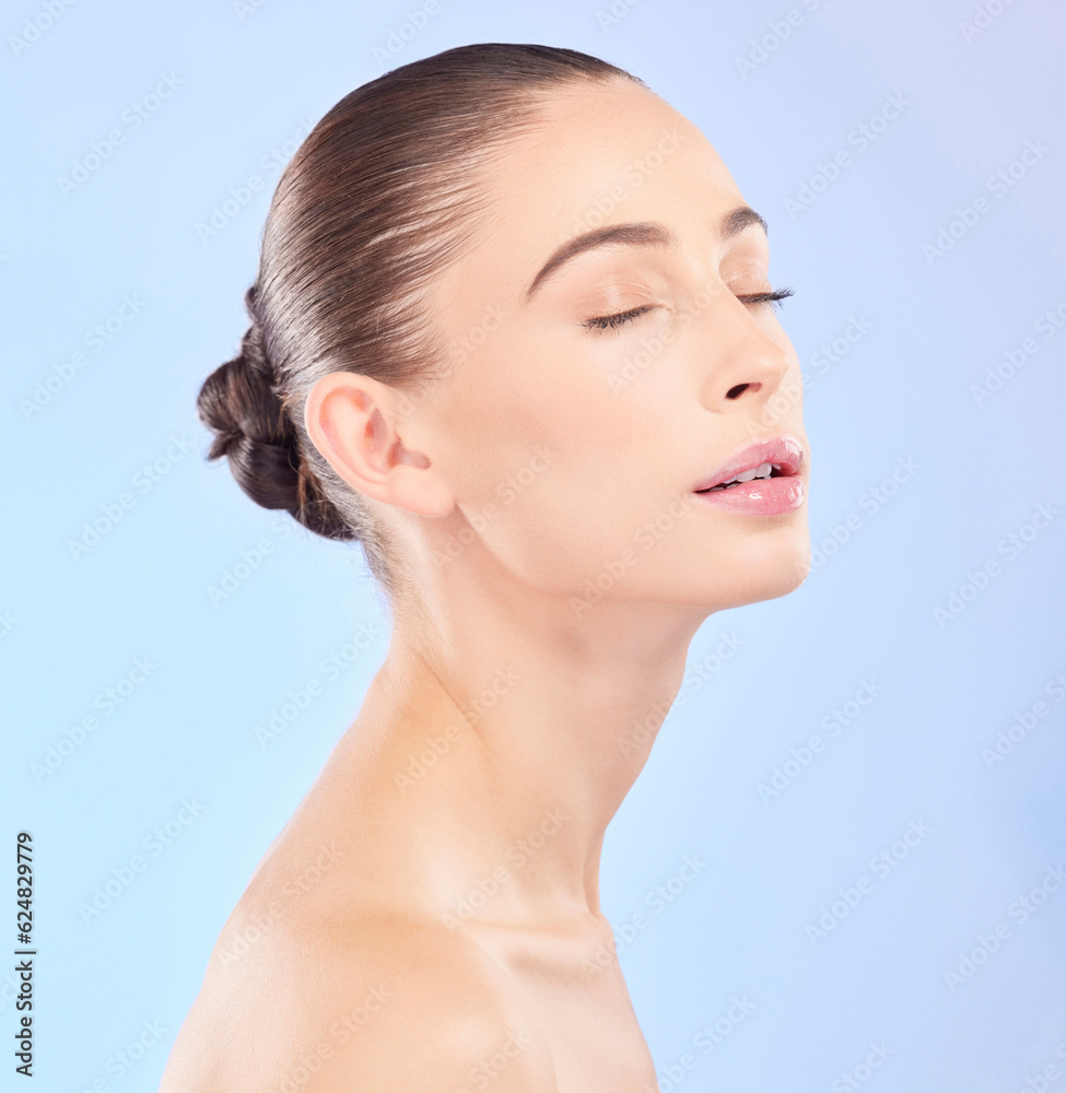 Woman, natural beauty and eyes closed in studio, blue background or facial wellness. Face, calm and 