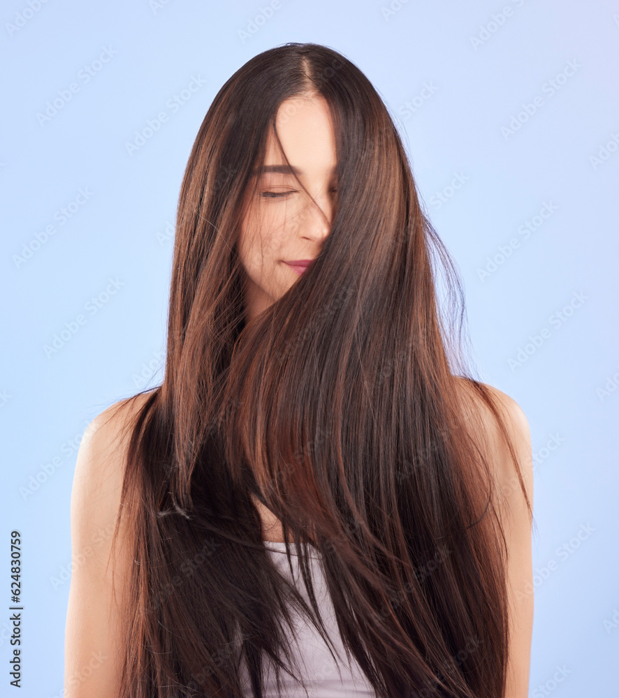 Luxury, texture and woman with hair care, cosmetics and wellness against a blue studio background. F