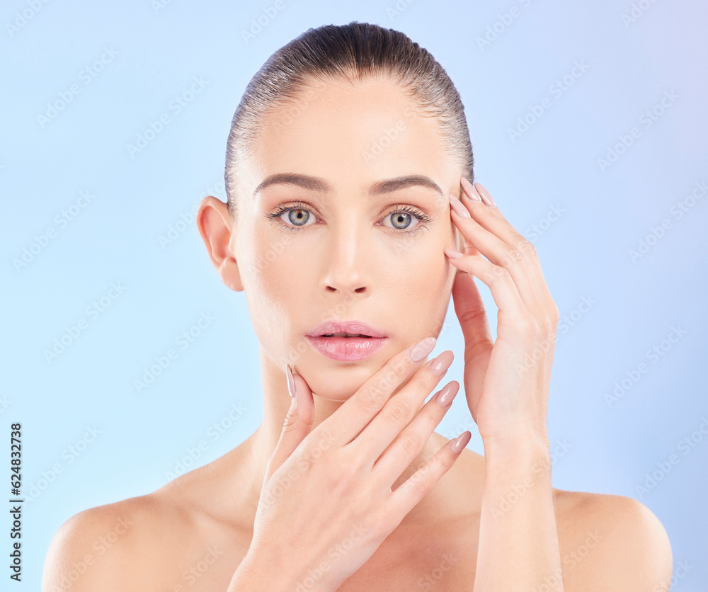 Portrait, woman and touch face in studio for beauty, aesthetic glow and dermatology on blue backgrou