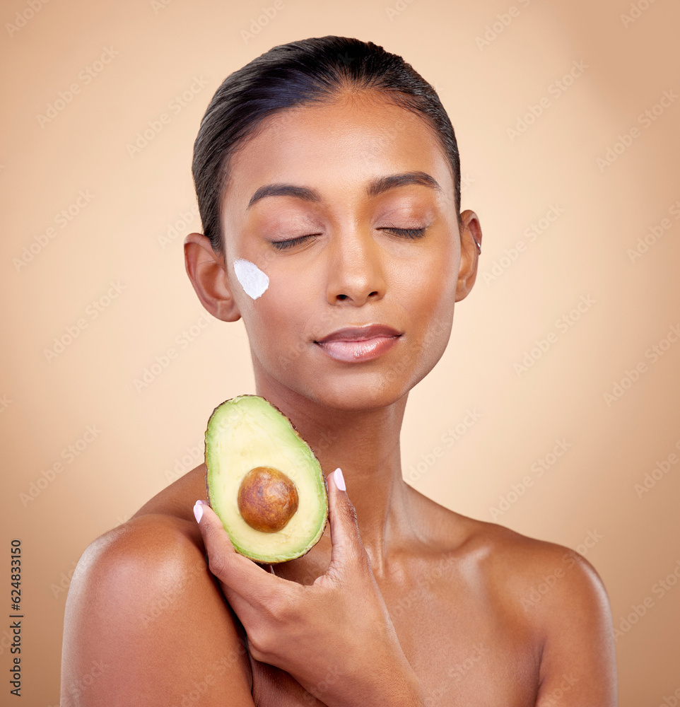 Avocado, cream and skincare with face of woman in studio for product, beauty and natural cosmetics. 