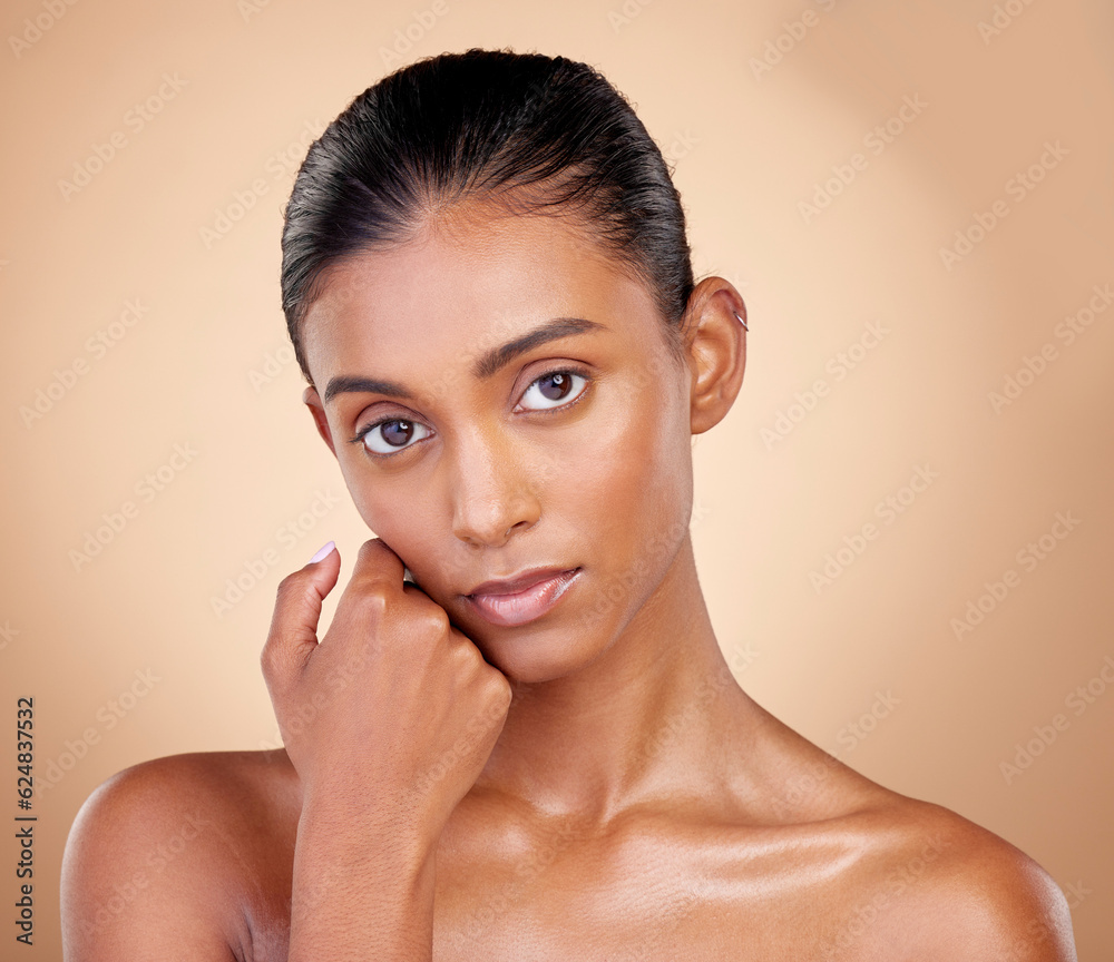 Skincare, beauty and portrait with indian girl with glow in brown studio background. Natural, seriou