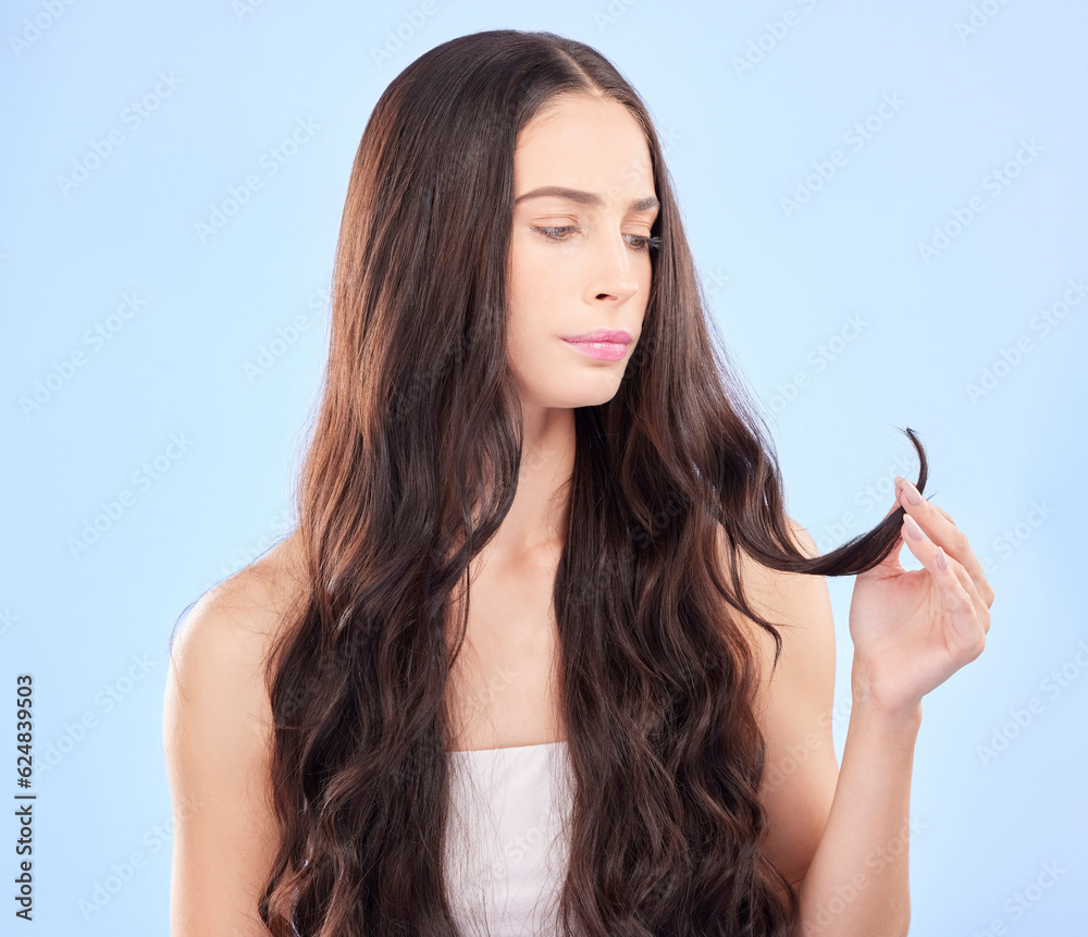 Hair care, woman and split end frustrated from beauty salon and shampoo treatment. Blue background, 