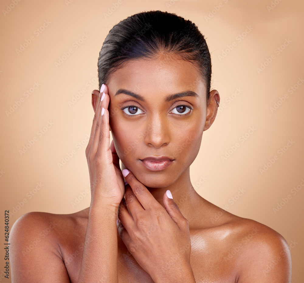 Portrait, makeup and Indian woman with cosmetics, dermatology and wellness against a brown studio ba