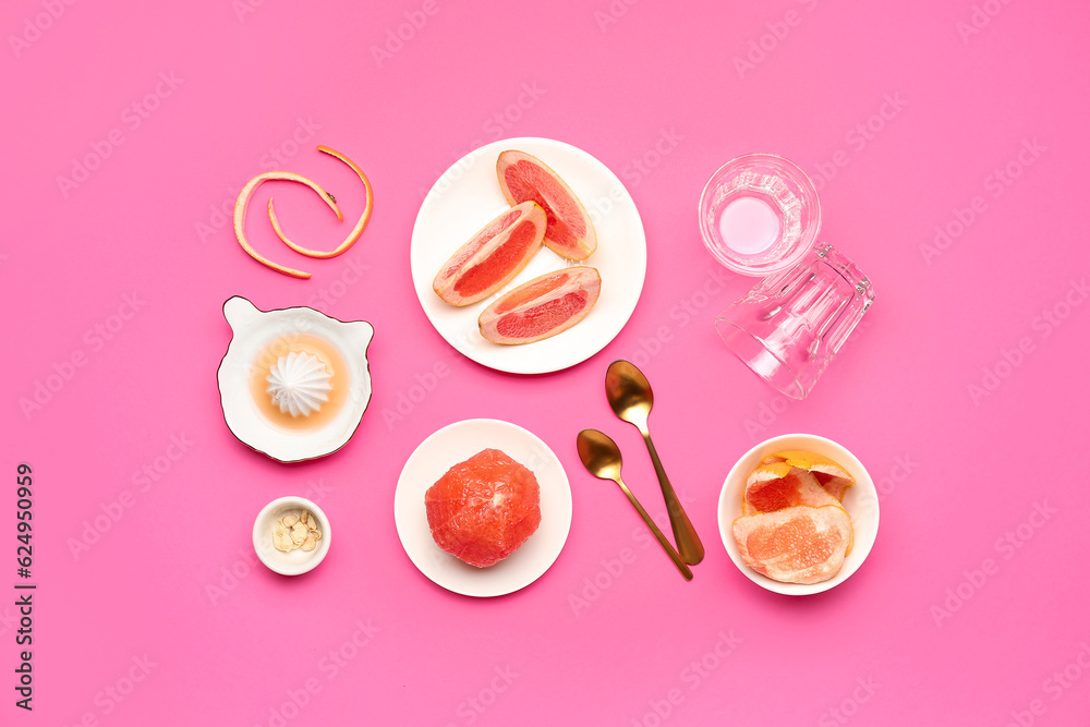 Composition with ripe grapefruits, peel and glasses on pink background