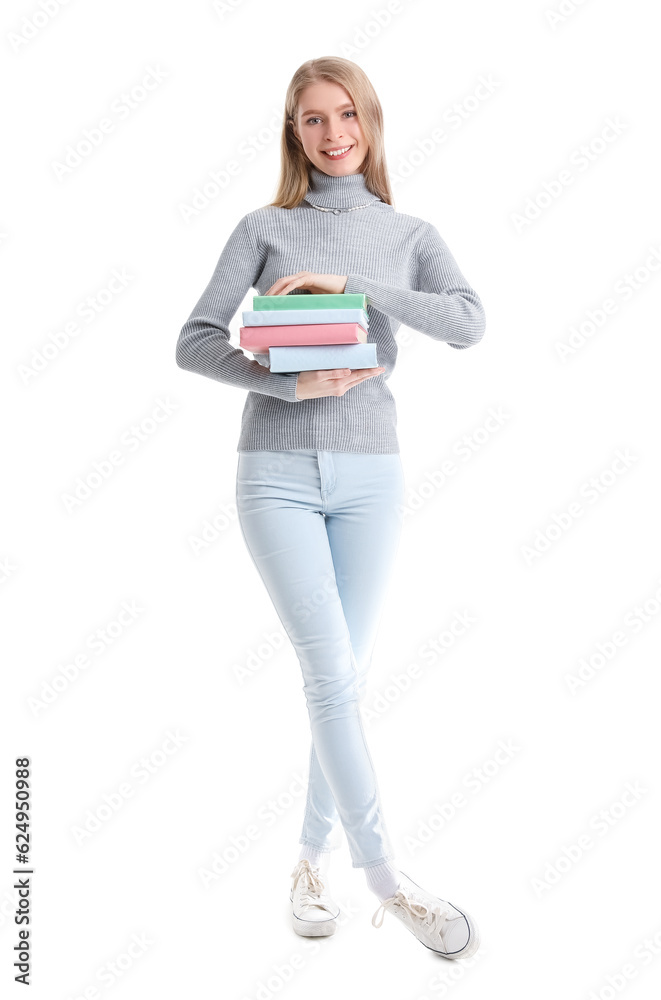 Young woman with books on white background