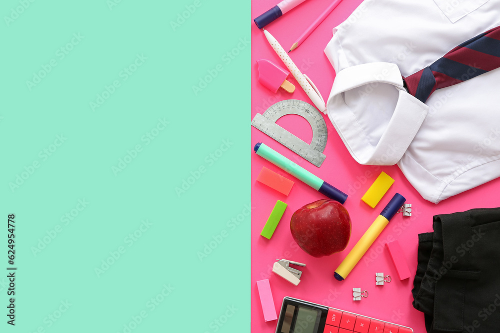 School uniform with fresh apple, calculator and different stationery on color background