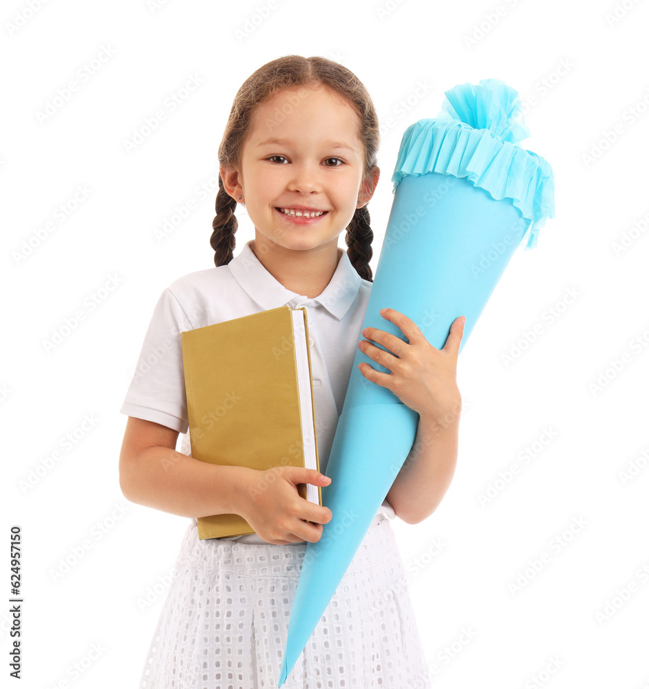 Happy little girl with blue school cone and book isolated on white background