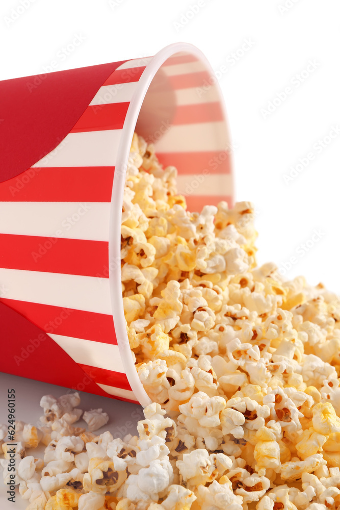 Bucket with tasty popcorn on white background, closeup