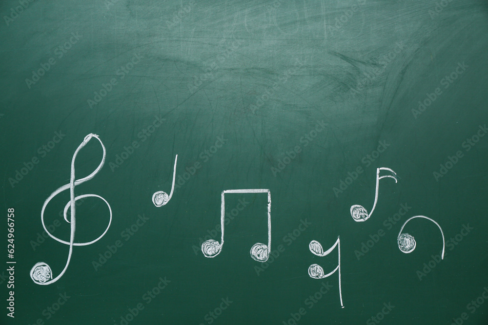 Different music notes on green background