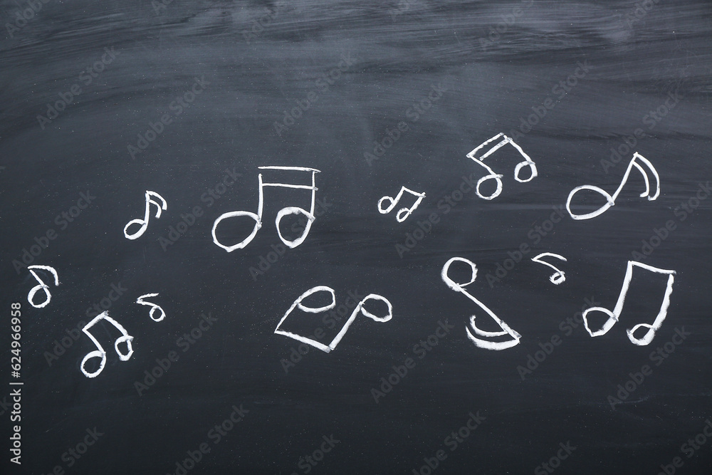 Different music notes on black background