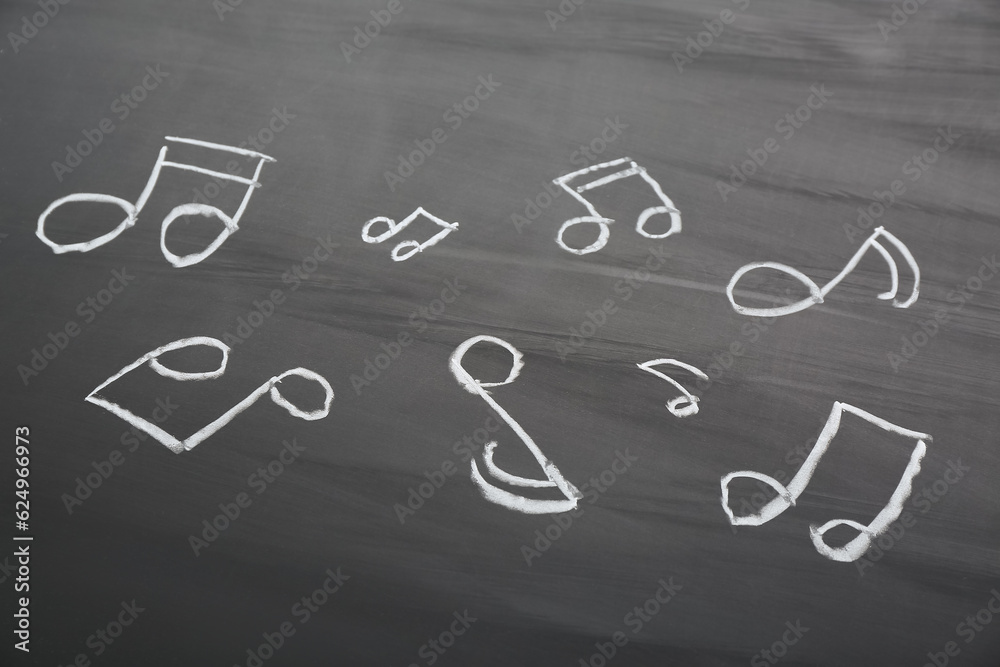 Different music notes on black background