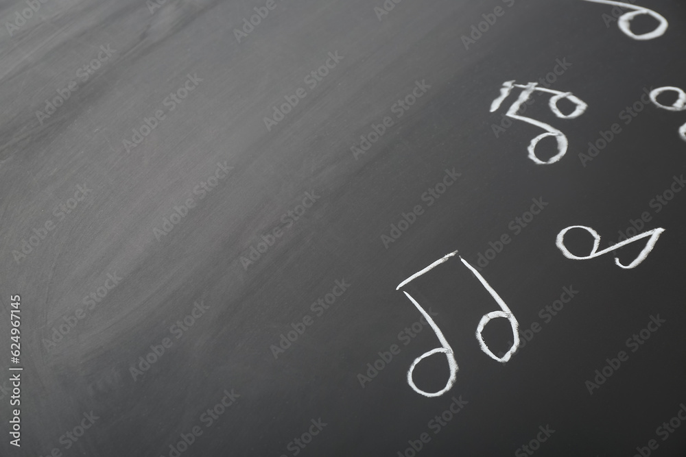 Different music notes on black background