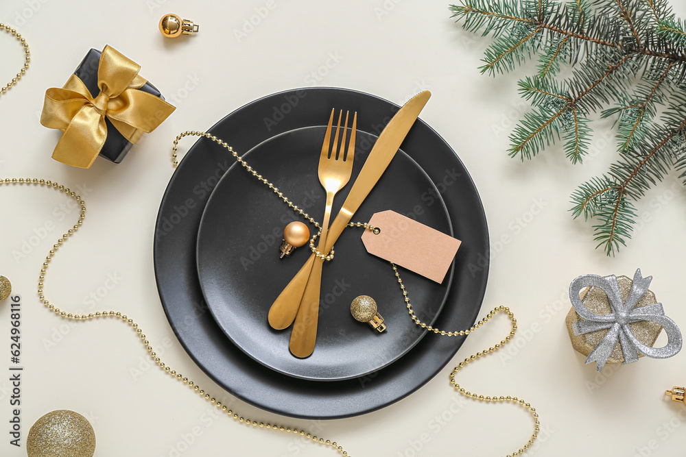 Beautiful table setting for Christmas celebration on light background