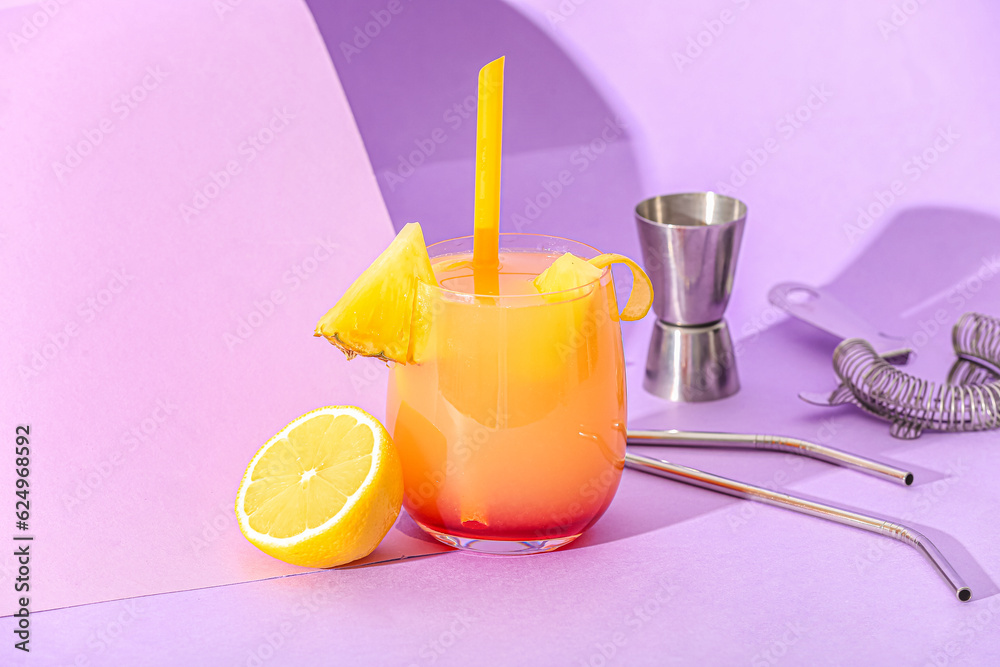 Glass of tasty mai tai cocktail on lilac background