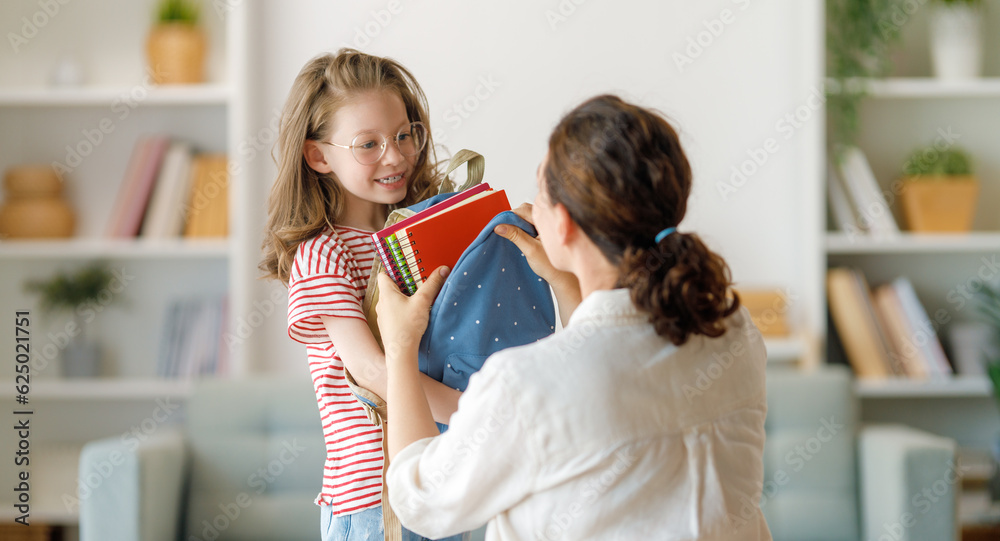 Happy family preparing for school