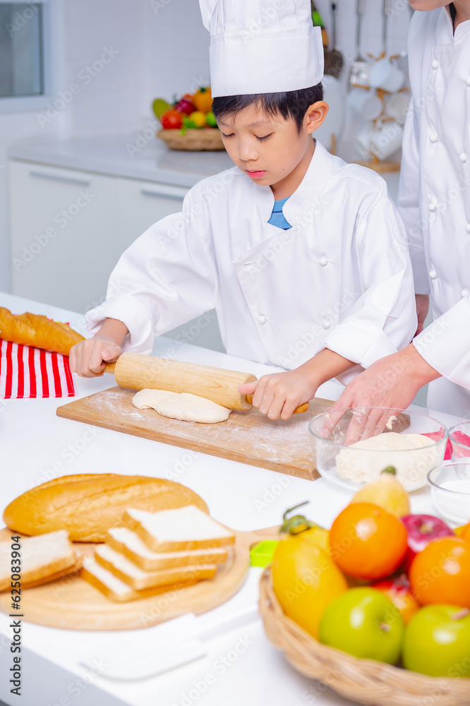 father and son cooking