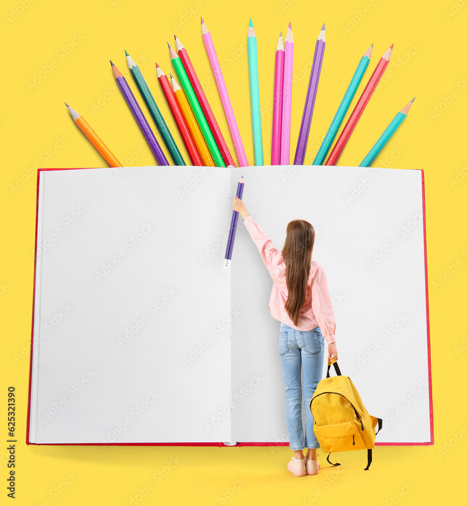 Little schoolgirl with backpack, big notebook and pencils on yellow background