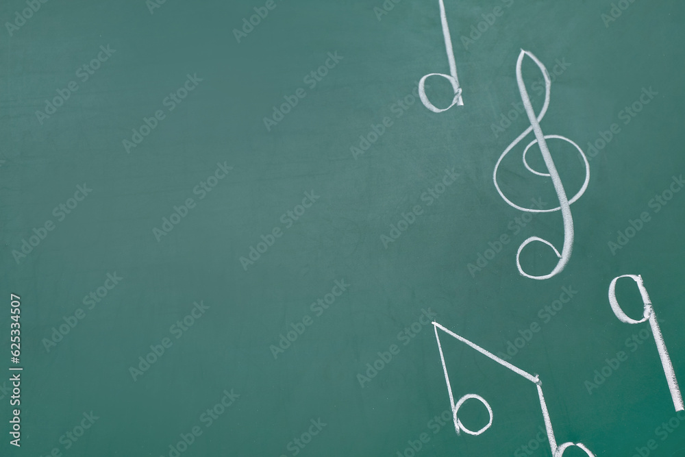 Different music notes on green background