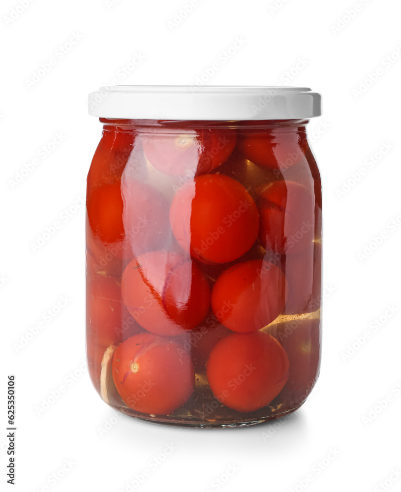 Jar with canned tomatoes on white background