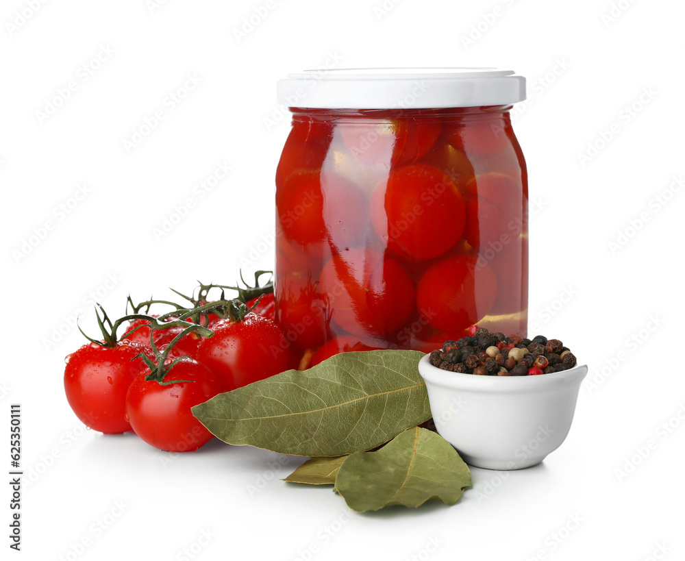 Jar with canned tomatoes and peppercorn on white background