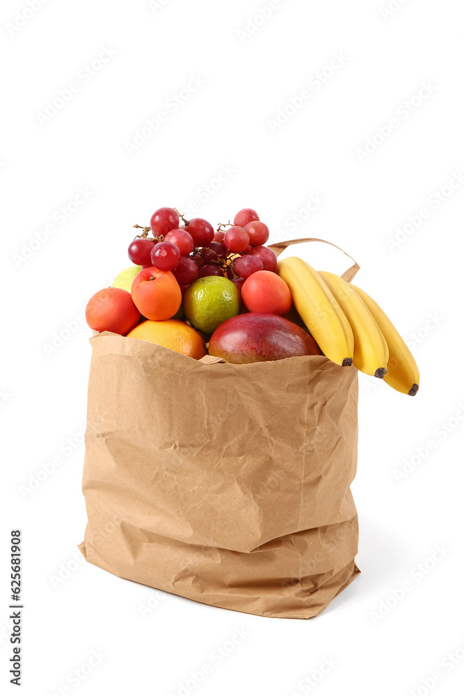 Paper bag with fresh fruits on white background. Grocery shopping concept