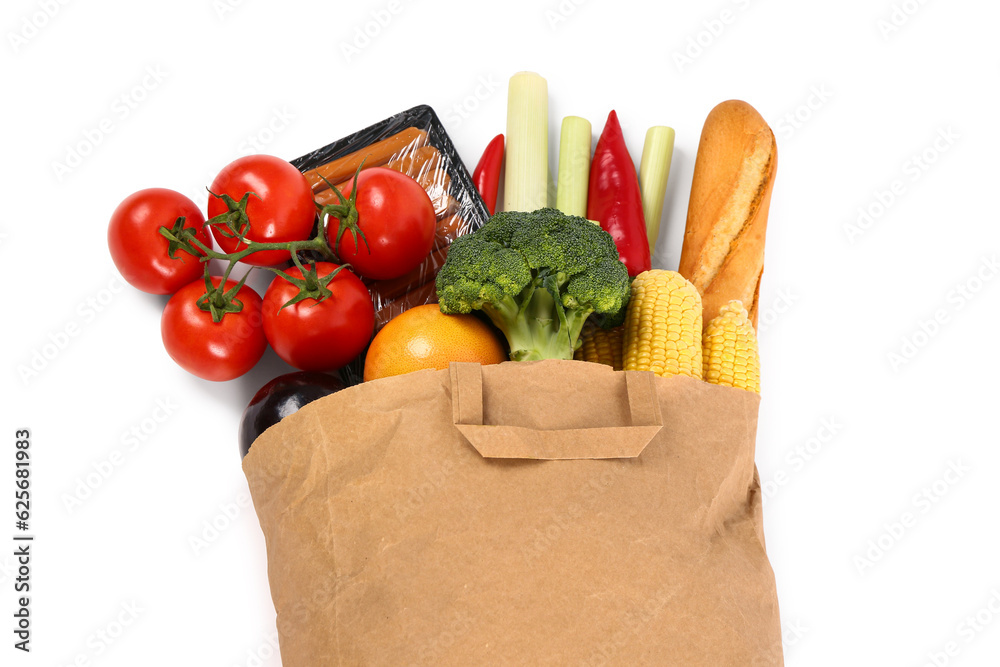 Paper bag with different products on white background. Grocery shopping concept