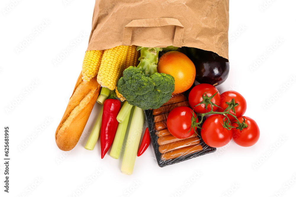 Paper bag with different products on white background. Grocery shopping concept