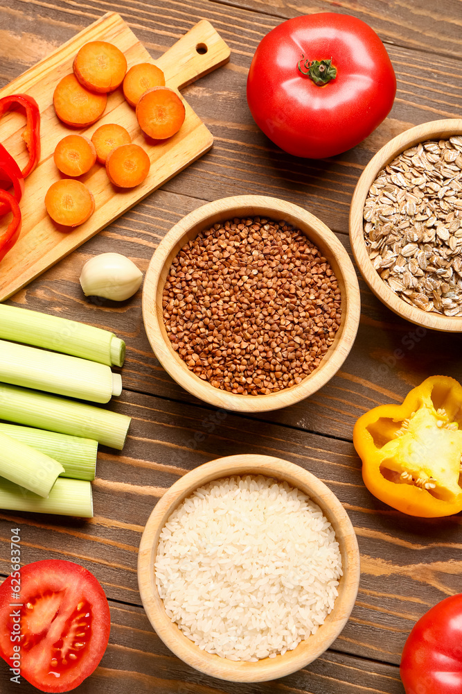 Different healthy products on wooden background