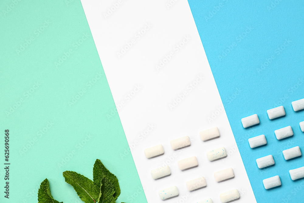 Fresh chewing gums with mint on colorful background