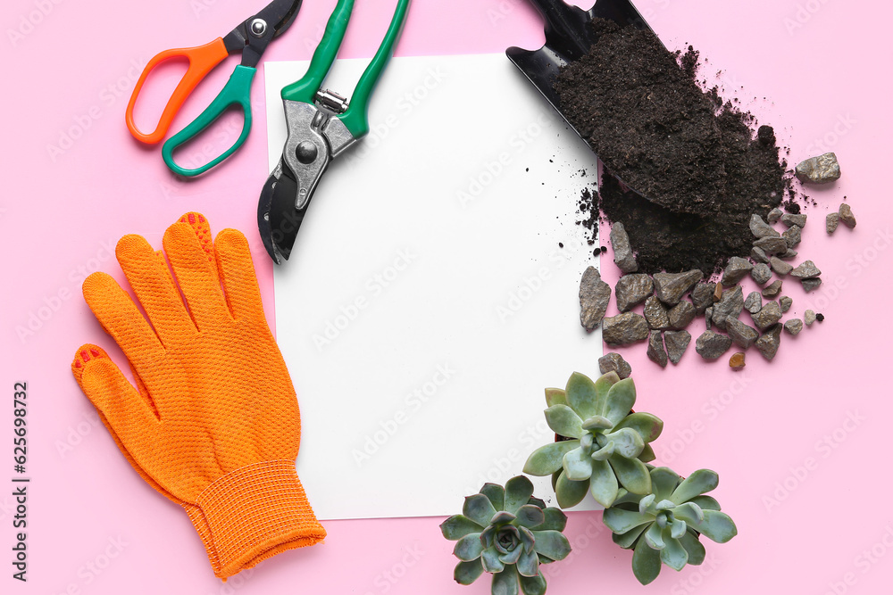 Blank paper, gardening tools and succulents on pink background