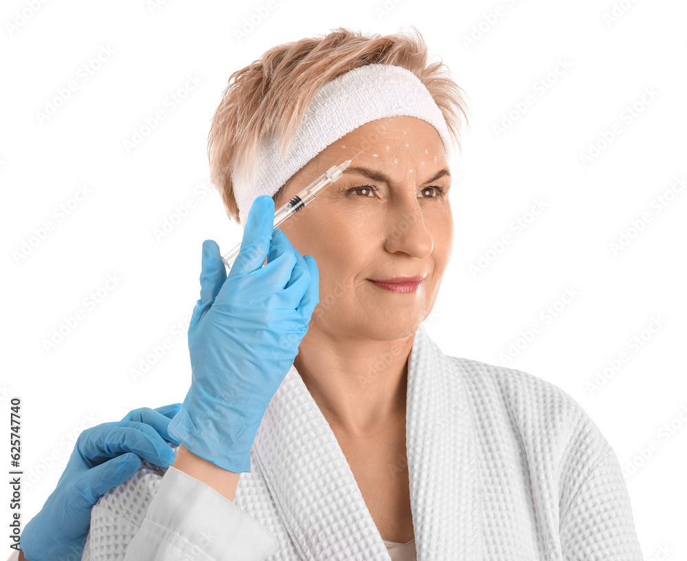 Mature woman receiving filler injection on white background, closeup