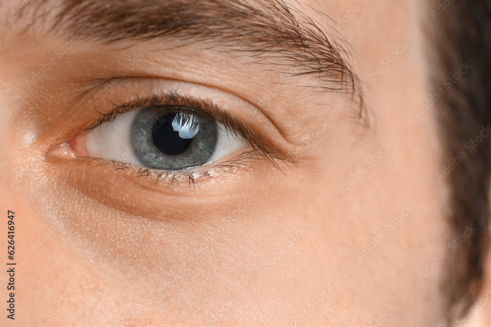 Young man with blue eyes, closeup