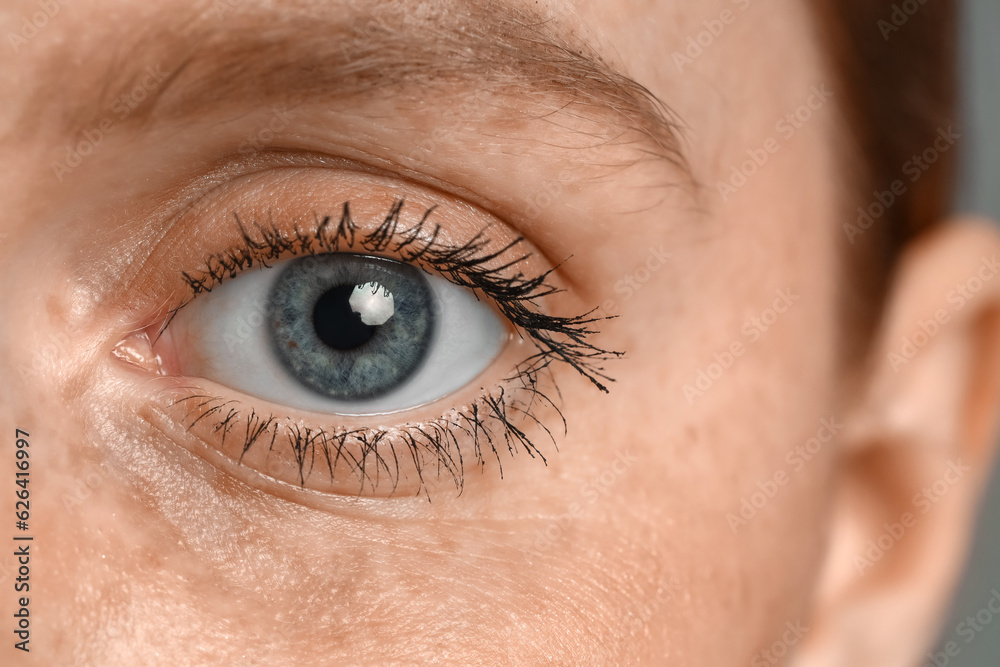 Young woman with blue eyes, closeup