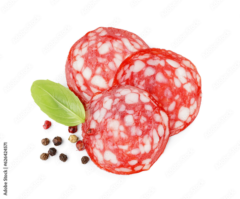 Slices of tasty salami on white background