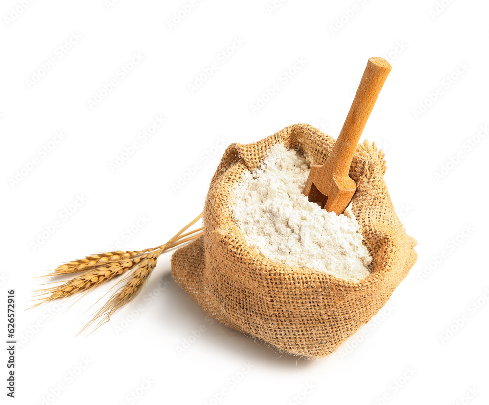 Sack bag with flour and wheat ears on white background