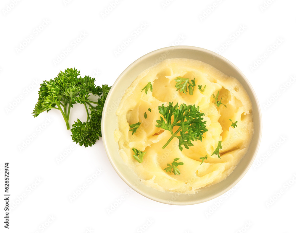 Bowl of tasty mashed potatoes with parsley on white background