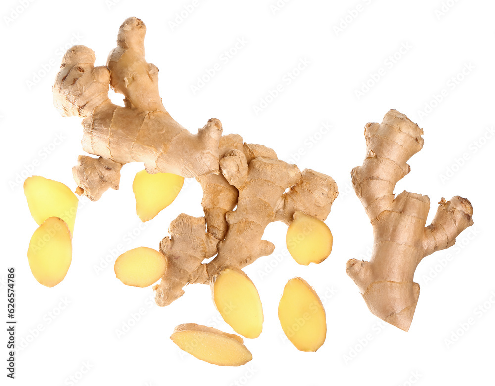 Flying fresh ginger roots on white background