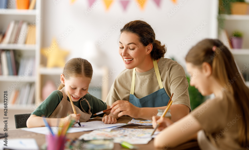 kids and teacher at the art class