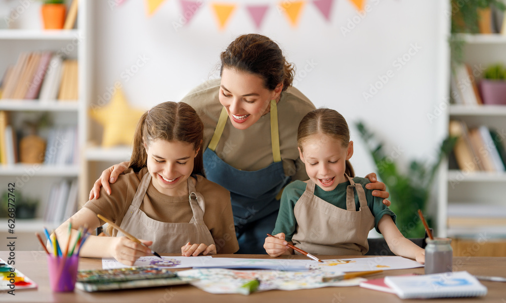 kids and teacher at the art class