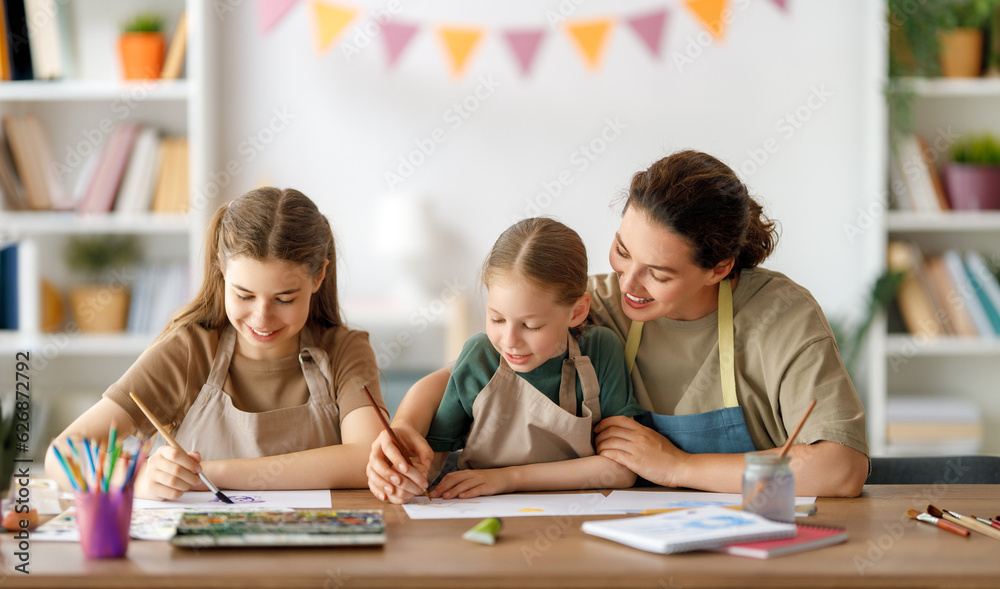 kids and teacher at the art class